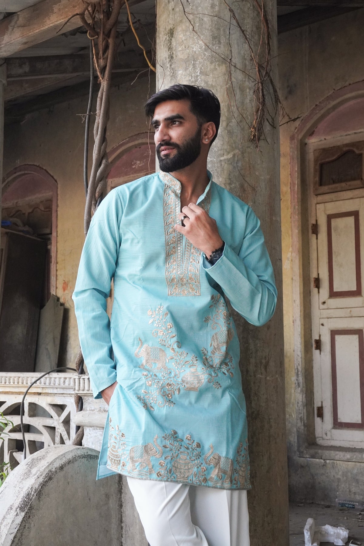 Airavat Firoza Kurta in turquoise with elephant embroidery, front view