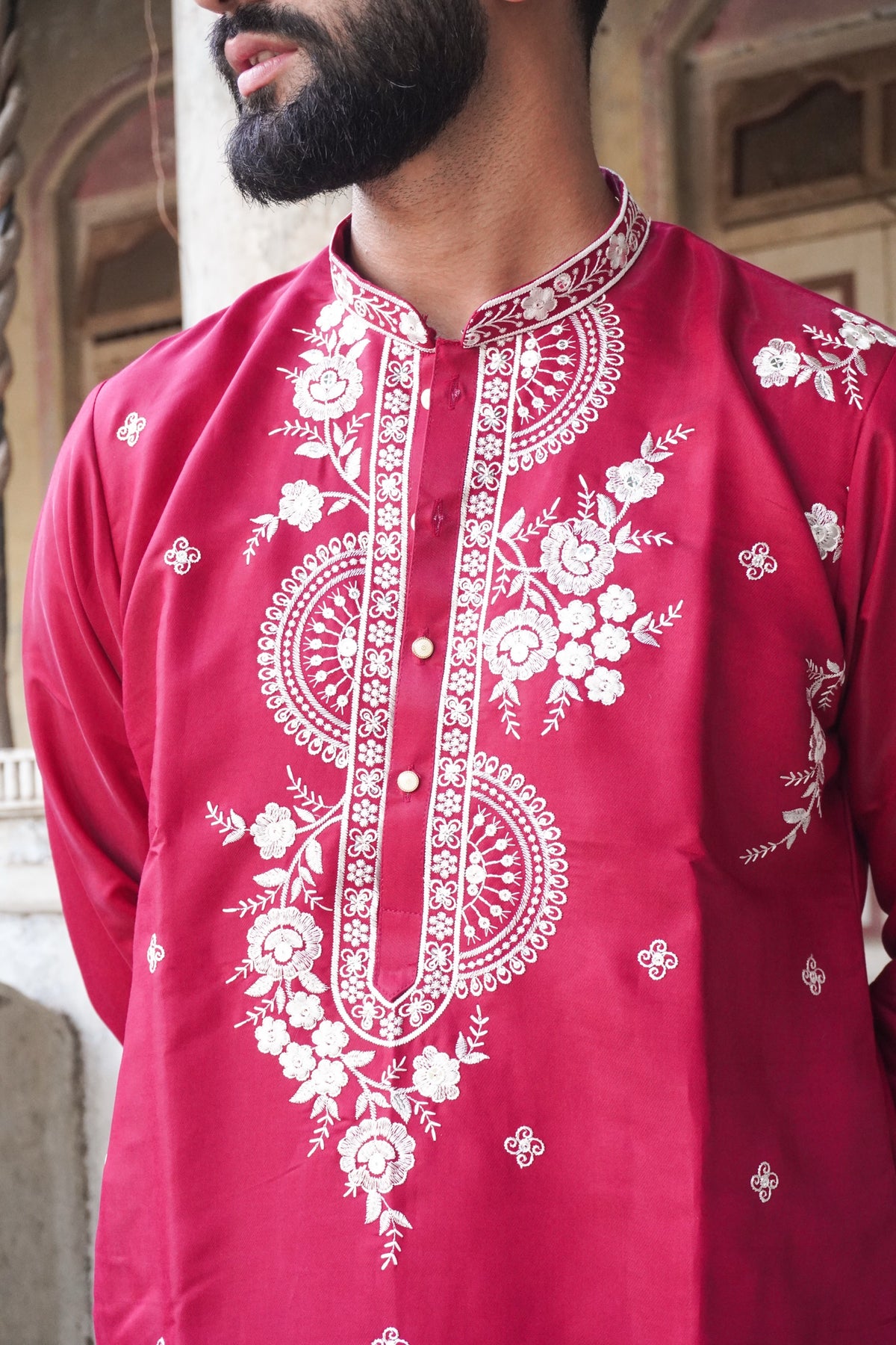 Close-up of mandala medallion and placket embroidery