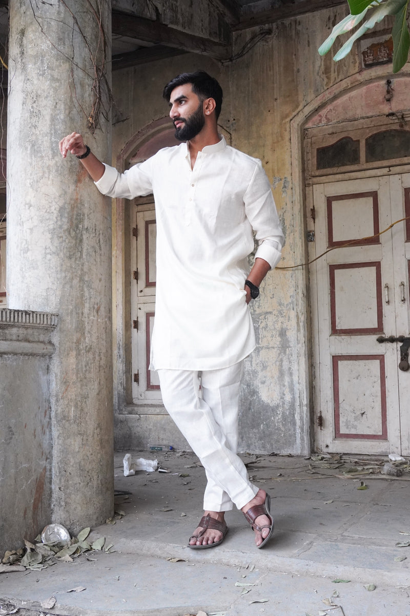 Dhawal Pearl Kurta Set in white with matching trousers, full length view