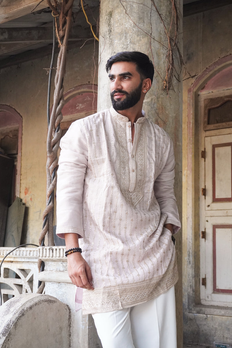 Ehsaas light purple kurta styled with white trousers