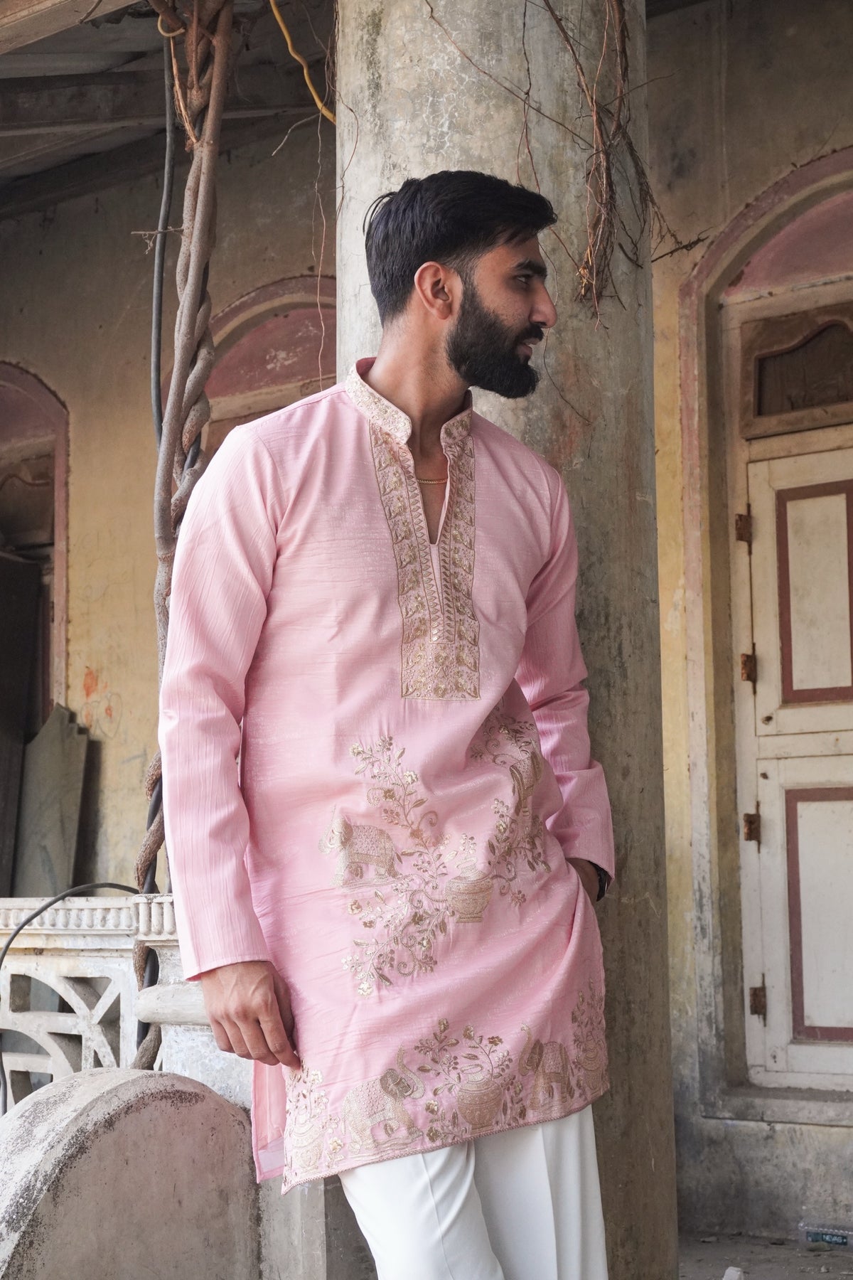 Gajraj pink kurta side pose showing elephant and kalash motifs