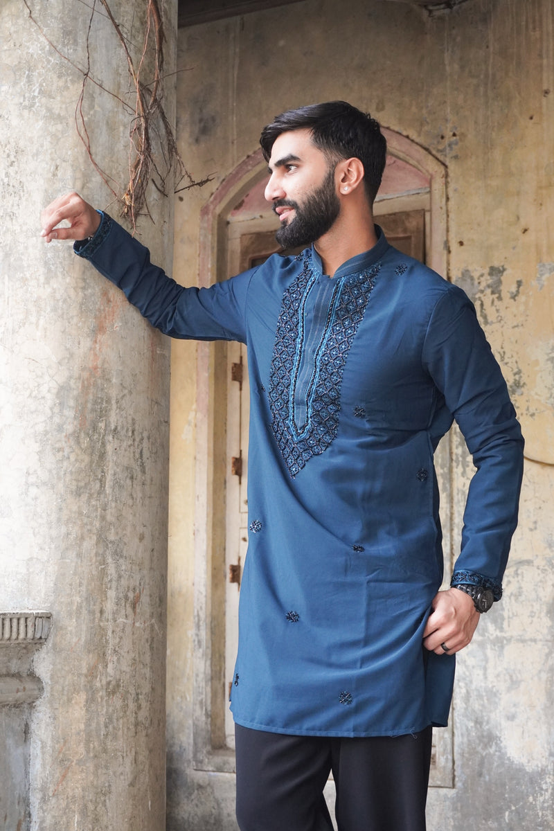Mayur peacock blue kurta side pose with beaded cuffs