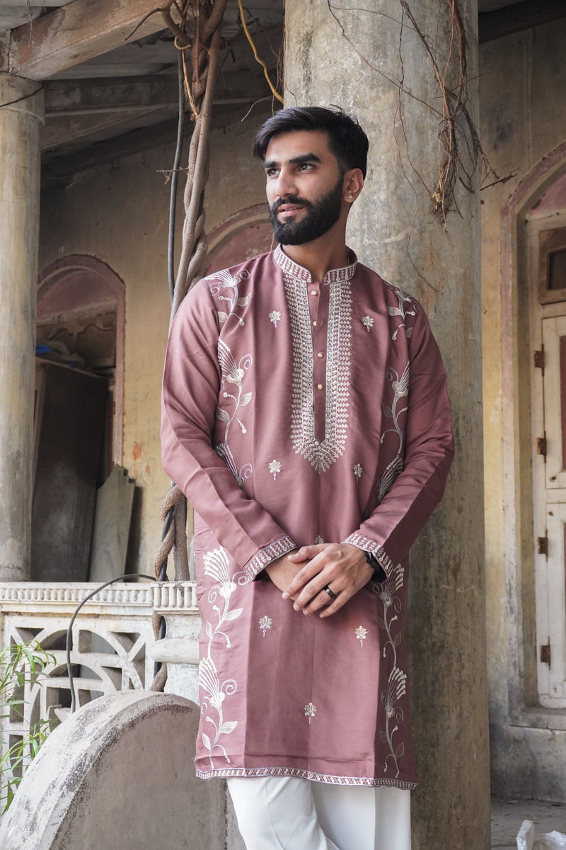 Naqsh Rosewood Kurta styled with ivory trousers