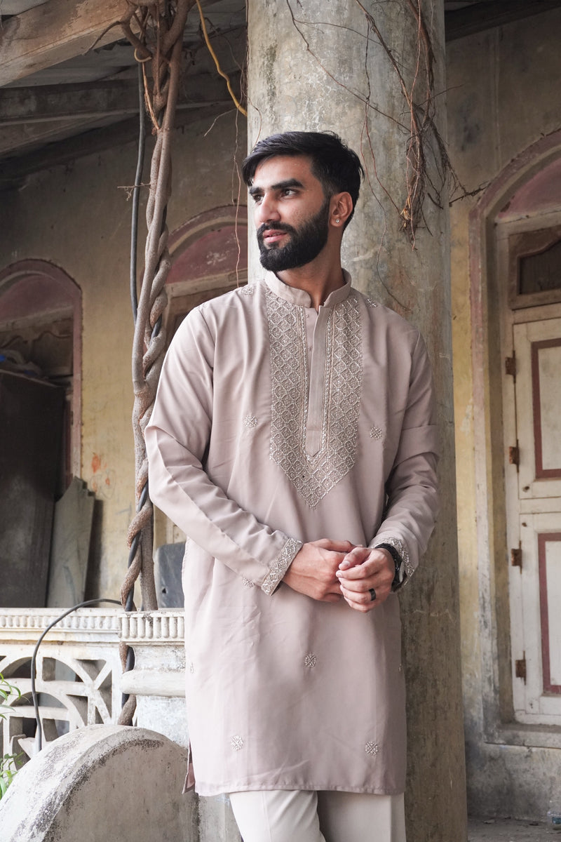 Rehmat taupe kurta styled by the pillar