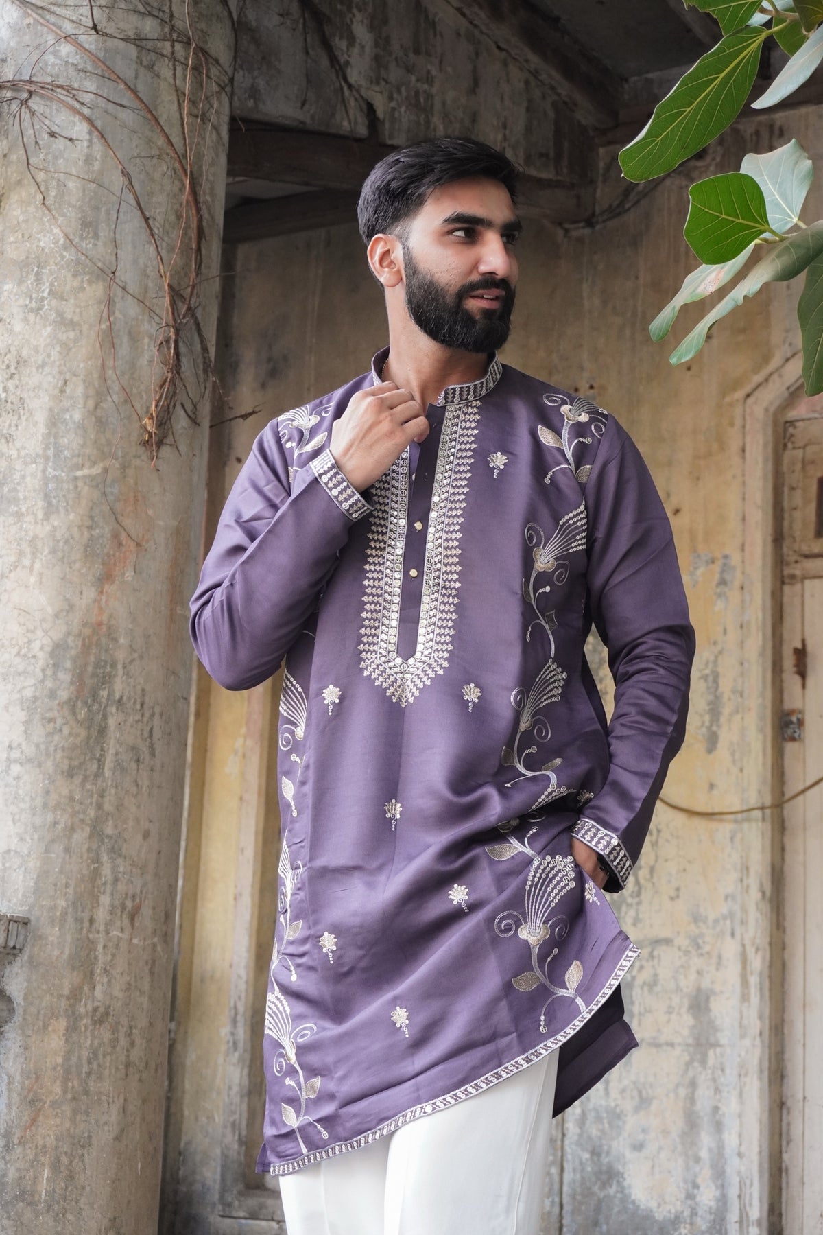 Riwaaz purple kurta styled with white trousers