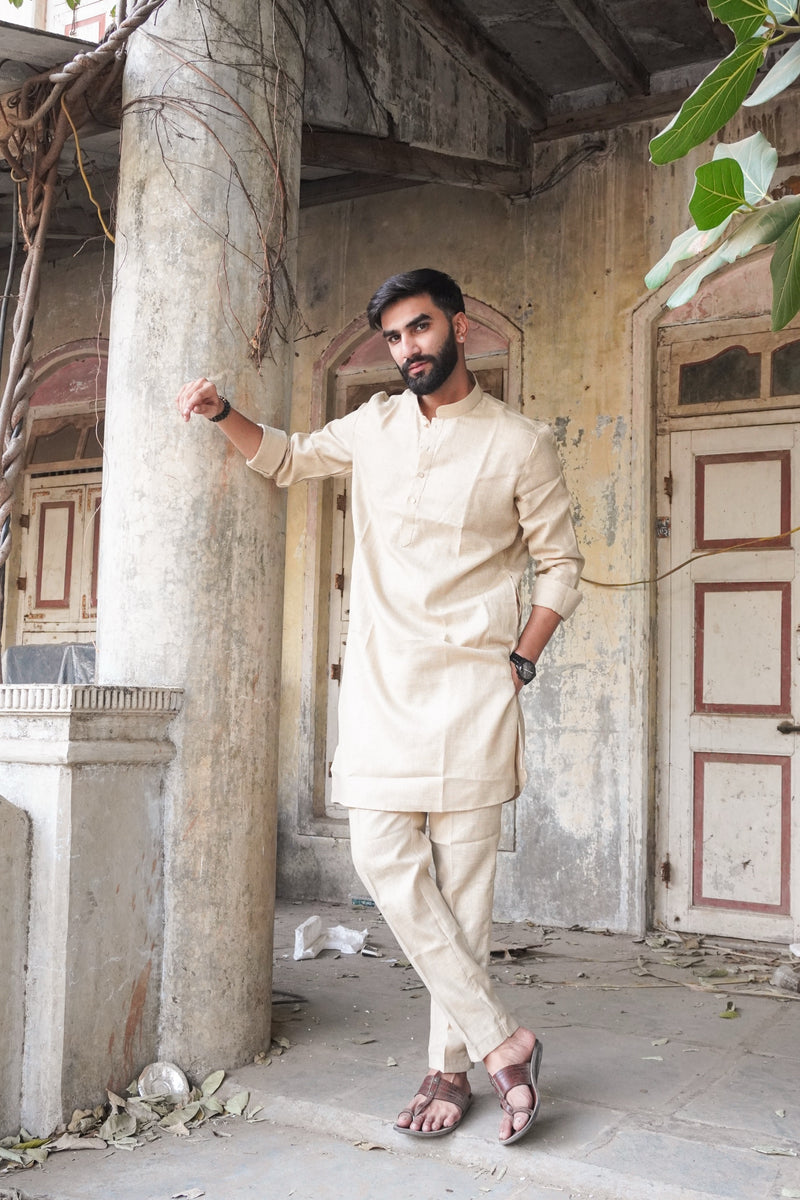 Saadgi Oat Kurta Set in beige with matching trousers, full length view
