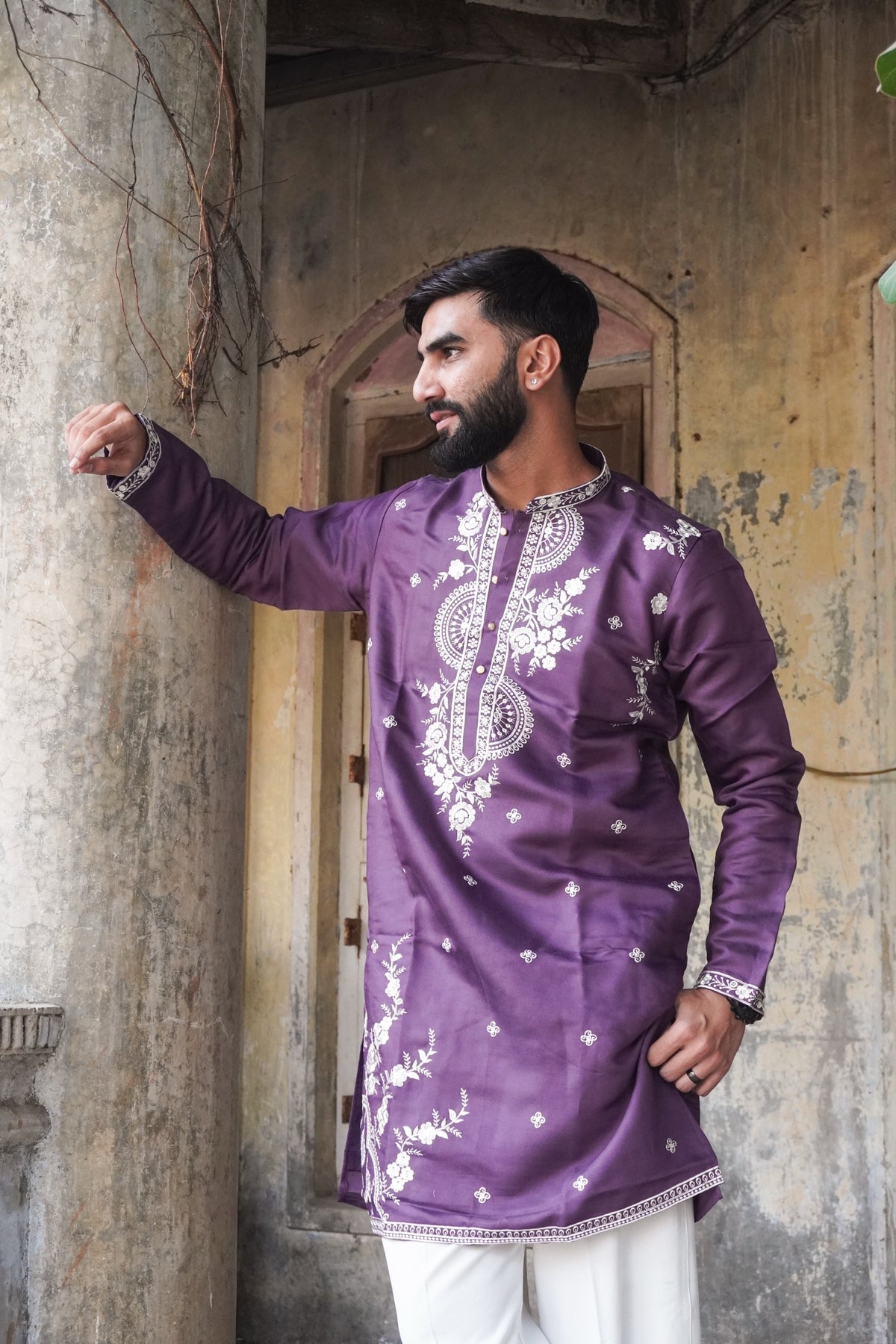 Shehzaad purple kurta side pose with embroidered cuffs